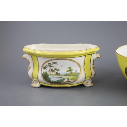 77 - A Derby yellow ground topographical slops bowl and a similar bough pot, c.1790-1800,the bowl painted... 