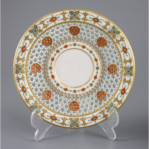 80 - A Royal Worcester 'jewelled' and reticulated cup and saucer, c.1870,decorated with raised jewelling ... 