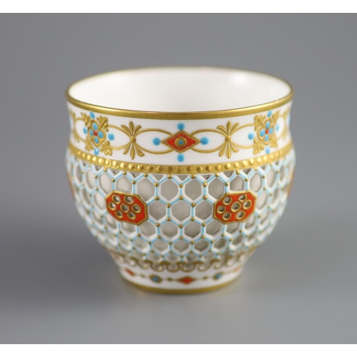 80 - A Royal Worcester 'jewelled' and reticulated cup and saucer, c.1870,decorated with raised jewelling ... 