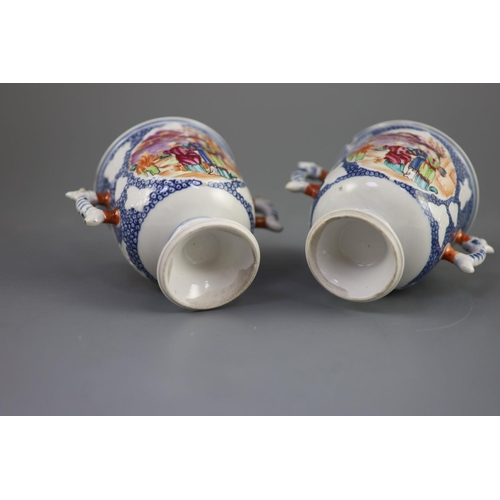 97 - A pair of Chinese famille rose two handled cups, Qianlong period,each painted with mandarin figures ... 