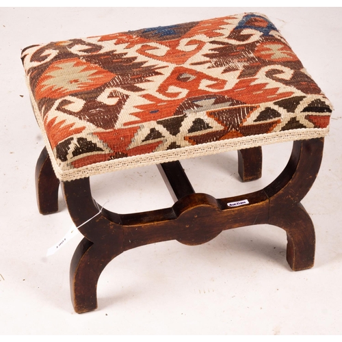 1061 - A Victorian beech 'X' framed stool with Kelim seat, length 48cm, depth 35cm, height 37cm... 