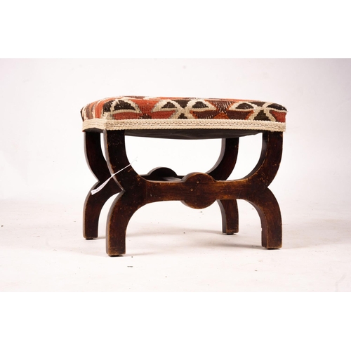 1061 - A Victorian beech 'X' framed stool with Kelim seat, length 48cm, depth 35cm, height 37cm... 
