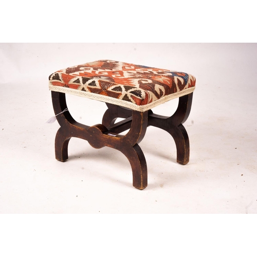 1061 - A Victorian beech 'X' framed stool with Kelim seat, length 48cm, depth 35cm, height 37cm... 