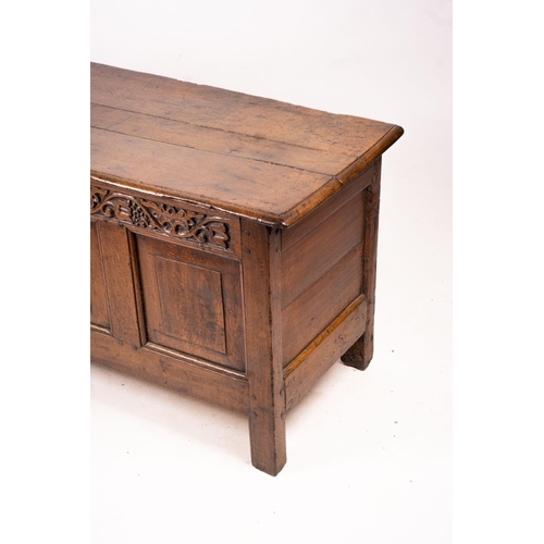 1064 - A 17th / 18th century carved oak coffer, length 132cm, depth 53cm, height 64cm