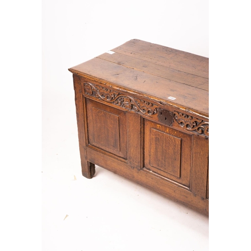 1064 - A 17th / 18th century carved oak coffer, length 132cm, depth 53cm, height 64cm