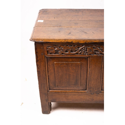 1064 - A 17th / 18th century carved oak coffer, length 132cm, depth 53cm, height 64cm