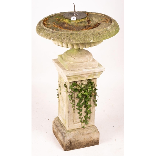 1066 - A reconstituted stone garden bird bath combined sundial on square pedestal base, height 108cm... 