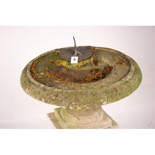 1066 - A reconstituted stone garden bird bath combined sundial on square pedestal base, height 108cm... 