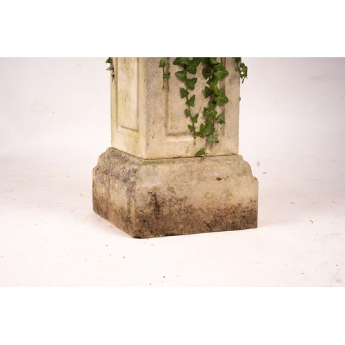 1066 - A reconstituted stone garden bird bath combined sundial on square pedestal base, height 108cm... 