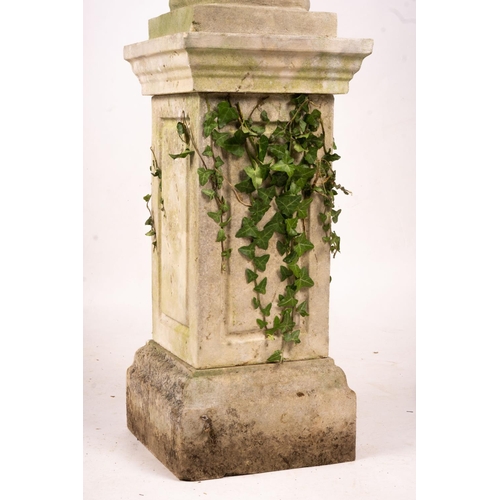 1066 - A reconstituted stone garden bird bath combined sundial on square pedestal base, height 108cm... 