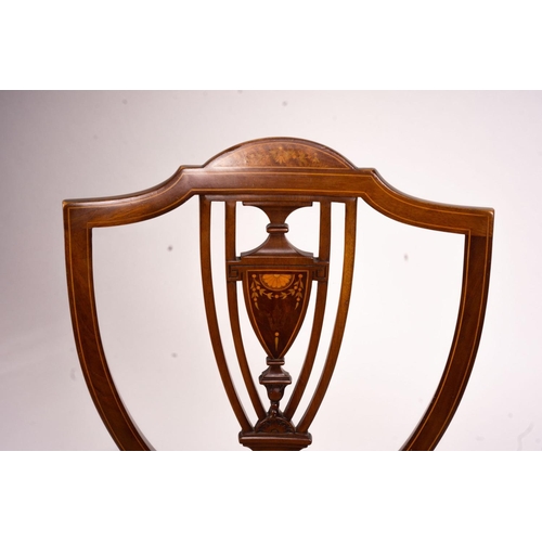 1068 - An Edwardian marquetry inlaid elbow chair (AF) and a side chair