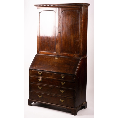 1069 - A George III oak bureau cabinet, width 108cm, depth 52cm, height 209cm