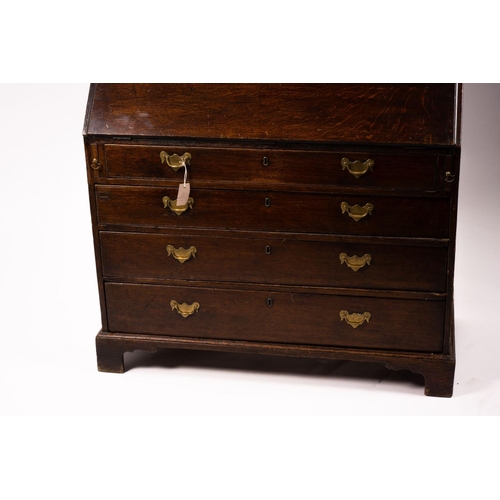 1069 - A George III oak bureau cabinet, width 108cm, depth 52cm, height 209cm