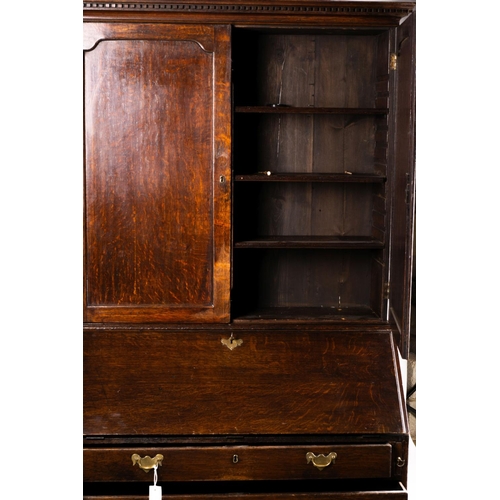 1069 - A George III oak bureau cabinet, width 108cm, depth 52cm, height 209cm