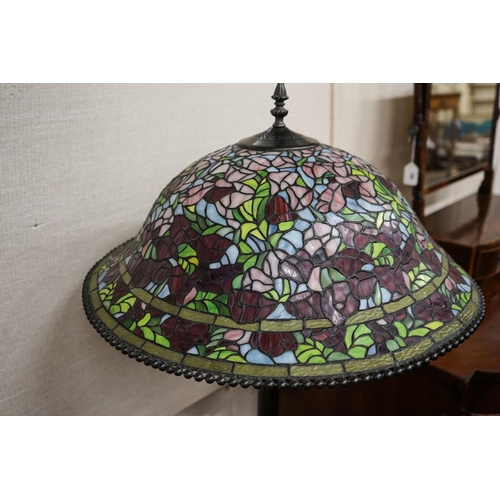 17 - A bronzed finish Tiffany style standard lamp with shade, 160cm high, 59cm diameter