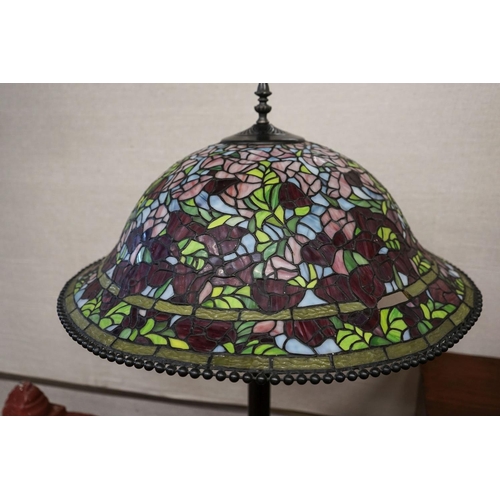17 - A bronzed finish Tiffany style standard lamp with shade, 160cm high, 59cm diameter