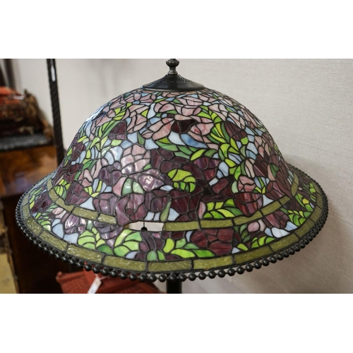 17 - A bronzed finish Tiffany style standard lamp with shade, 160cm high, 59cm diameter