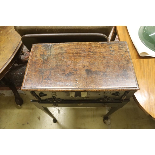 107 - A late 17th century oak bible box, monogrammed EP, dated 1697, raised on a stand, width 62cm, depth ... 