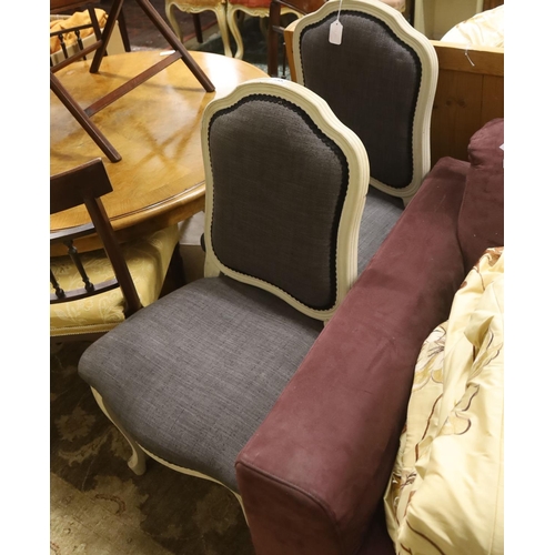 108 - A pair of grey upholstered dining chairs