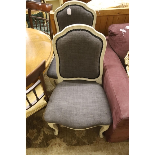 108 - A pair of grey upholstered dining chairs