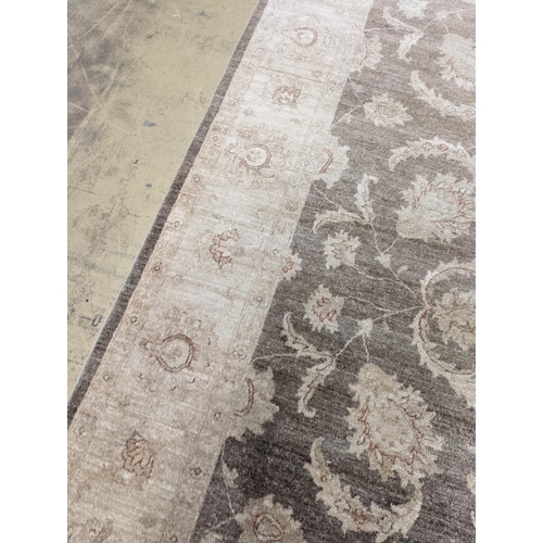 111 - A Zeigler style ivory ground carpet, 300 x 240cm