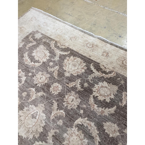 111 - A Zeigler style ivory ground carpet, 300 x 240cm