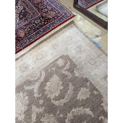 111 - A Zeigler style ivory ground carpet, 300 x 240cm