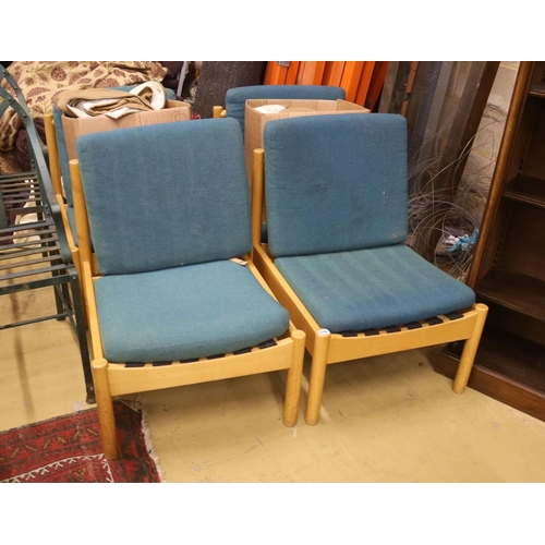 116 - A set of four Ercol pale beech lounge chairs with cushion seats and backs, width 60cm, depth 66cm, h... 