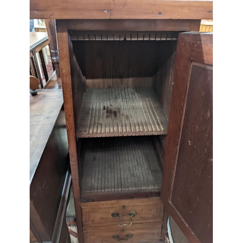 12 - An Edwardian satinwood banded mahogany cabinet, of tapering form, width 37cm, depth 37cm, height 106... 