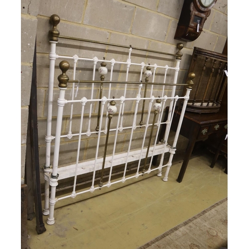 125 - A Victorian style porcelain mounted iron and brass double bed frame, width 136cm