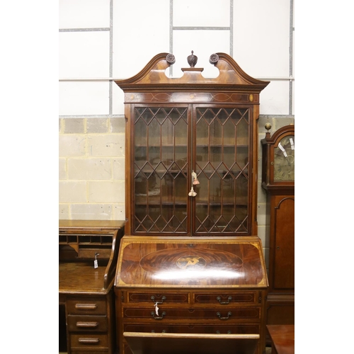 133 - A George III style inlaid mahogany bureau bookcase, length 132cm, depth 57cm, height 276cm... 