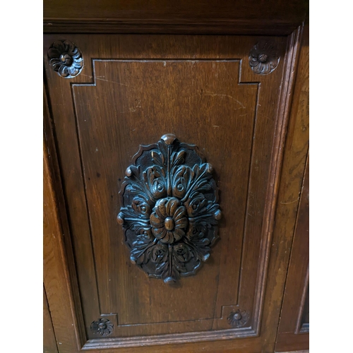 138 - A Victorian oak side cabinet, length 150cm, depth 62cm, height 130cm