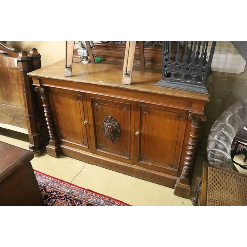 138 - A Victorian oak side cabinet, length 150cm, depth 62cm, height 130cm