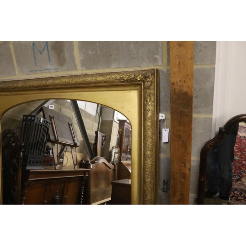 141 - A giltwood and gesso overmantel mirror with arched plate, width 115cm, height 112cm