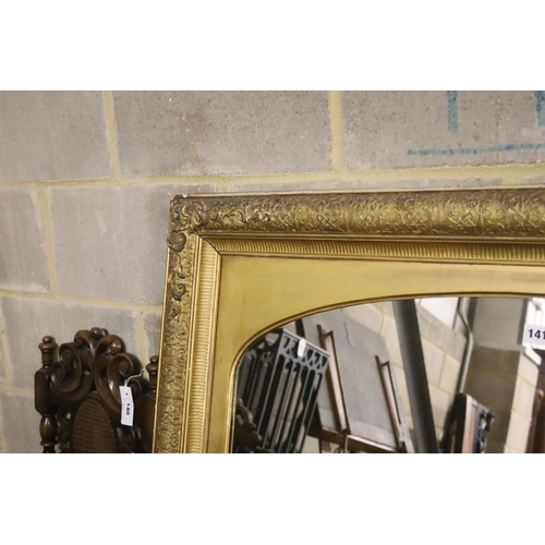 141 - A giltwood and gesso overmantel mirror with arched plate, width 115cm, height 112cm