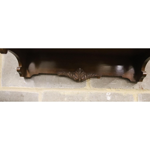 147 - A mahogany three shelf wall bracket, width 57cm, depth 23cm, height 94cm