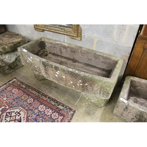 148 - A 19th century carved stone bow fronted trough, length 133cm, depth 57cm, height 54cm