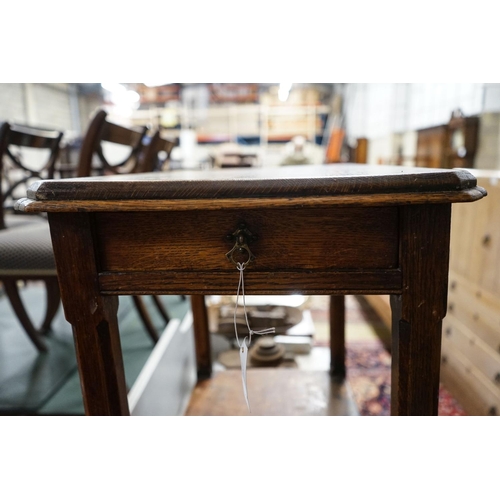 151 - A Victorian Aesthetic movement oak two tier side table, width 62cm, depth 40cm, height 73cm... 