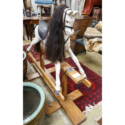 152 - A Victorian style dapple grey rocking horse on pine stand, length 152cm, height 126cm