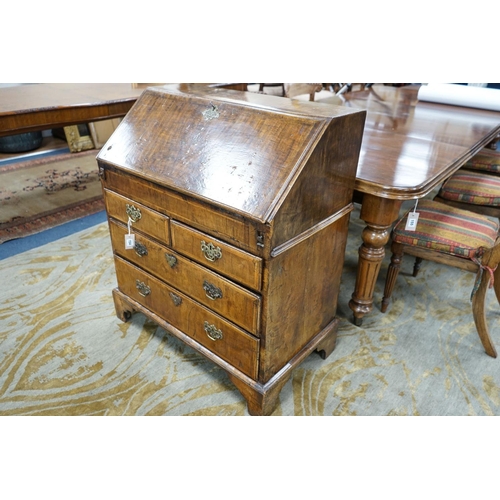 154 - A George I feather banded walnut bureau with well interior, width 83cm, depth 48cm, height 98cm... 