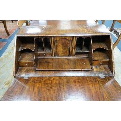 154 - A George I feather banded walnut bureau with well interior, width 83cm, depth 48cm, height 98cm... 