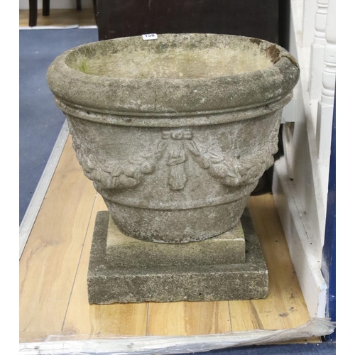 158 - A circular reconstituted stone garden planter on square plinth, diameter 49cm, height 46cm... 