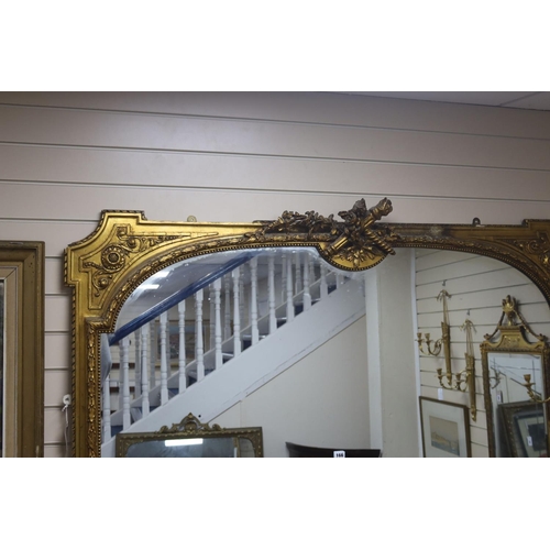 166 - A large Victorian giltwood and gesso overmantel mirror, width 160cm, height 232cm