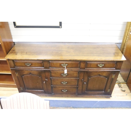 170 - An 18th century style oak low dresser, length 168cm, depth 53cm, height 83cm