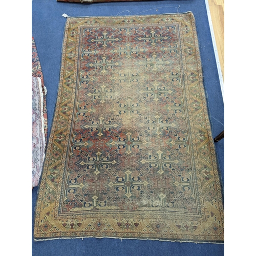 173 - Three antique rugs, Caucasian and North West Persian, largest 230 x 154cm