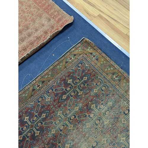 173 - Three antique rugs, Caucasian and North West Persian, largest 230 x 154cm