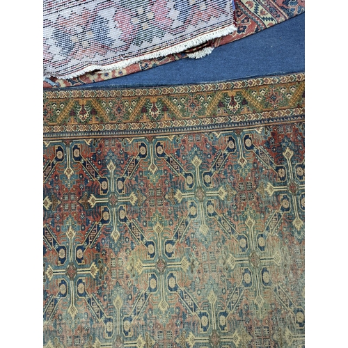 173 - Three antique rugs, Caucasian and North West Persian, largest 230 x 154cm