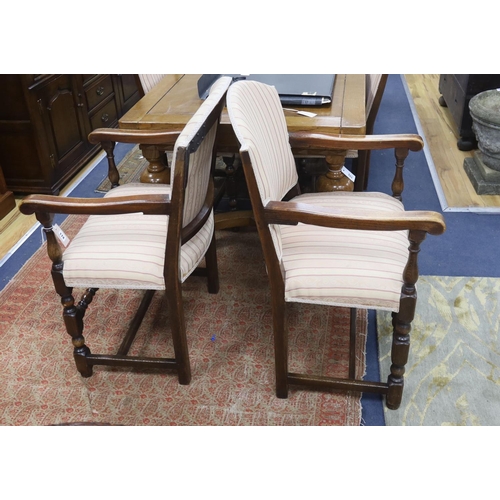 174 - A set of eight 18th century style upholstered oak dining chairs, two with arms