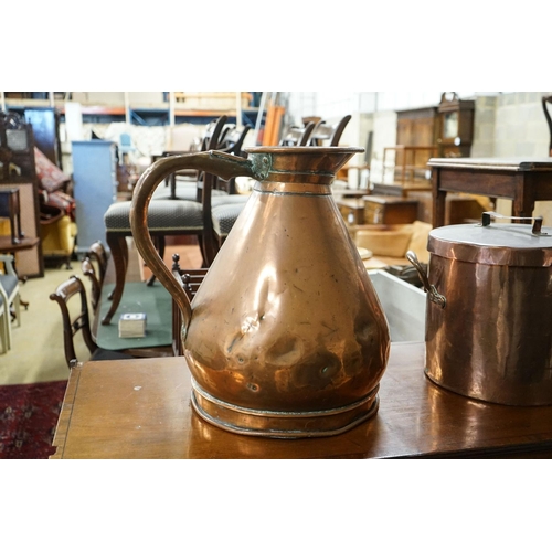 178 - A Victorian copper jug measure, together with a Victorian copper harvest flagon, larger 48cm high... 