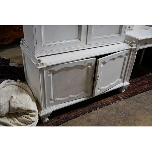 18 - A painted four door cabinet, width 118cm, depth 60cm, height 152cm